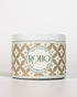 Scented Candle with a decorative patterned label on a white background. Winter Candle, Myrrh scent
