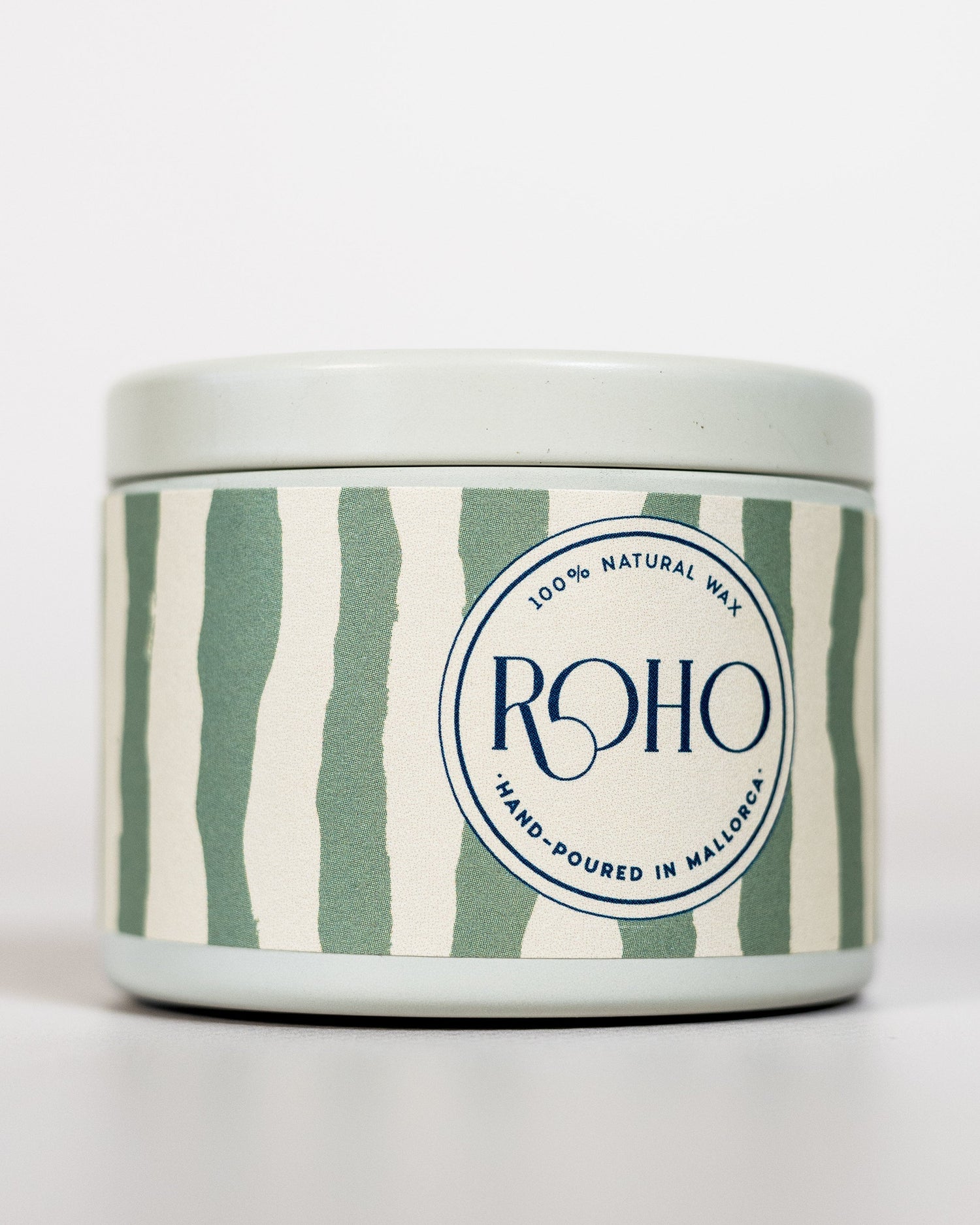 Vela con diseño a rayas y &