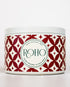 Scented Candle with red and white pattern label and &