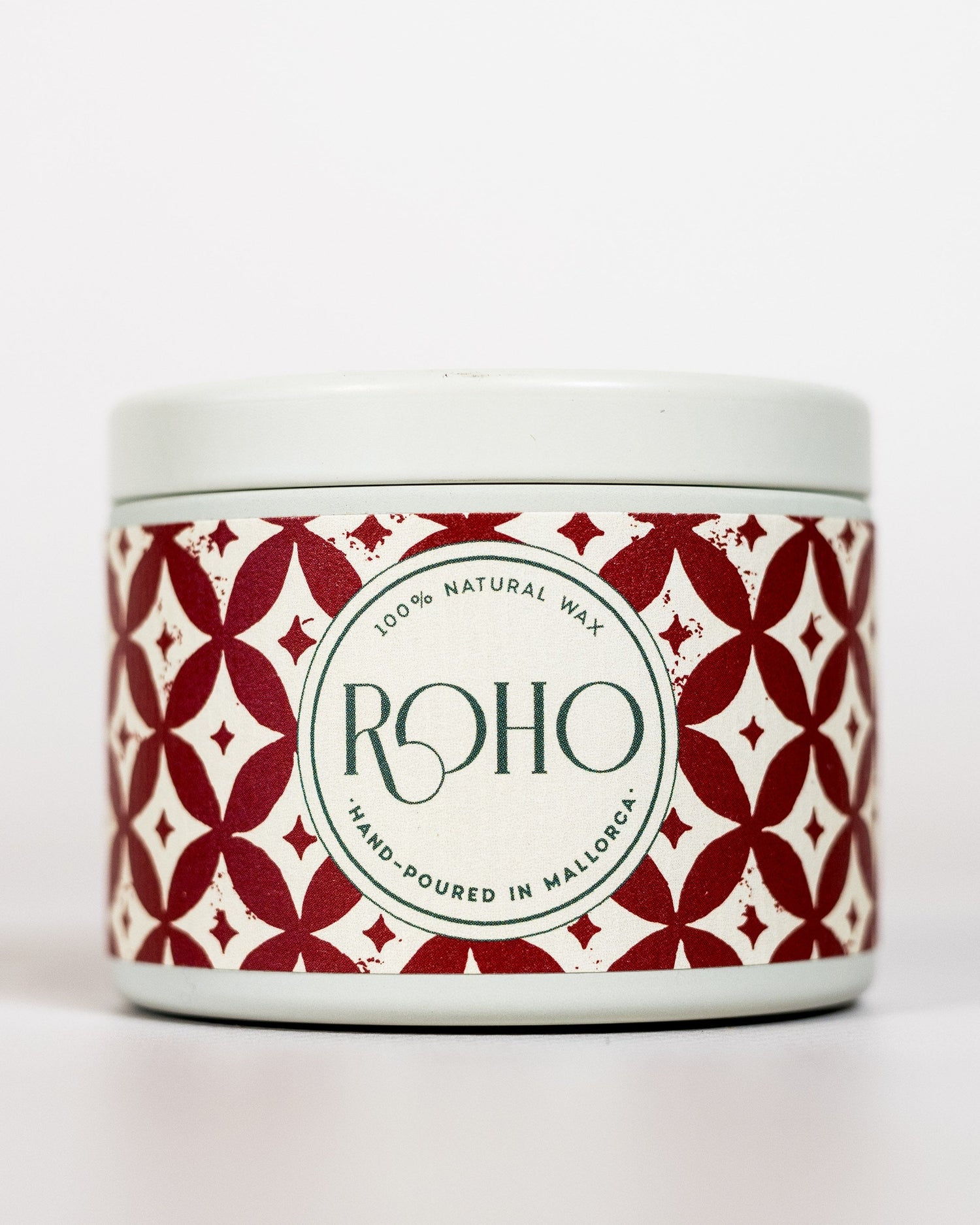 Scented Candle with red and white pattern label and &